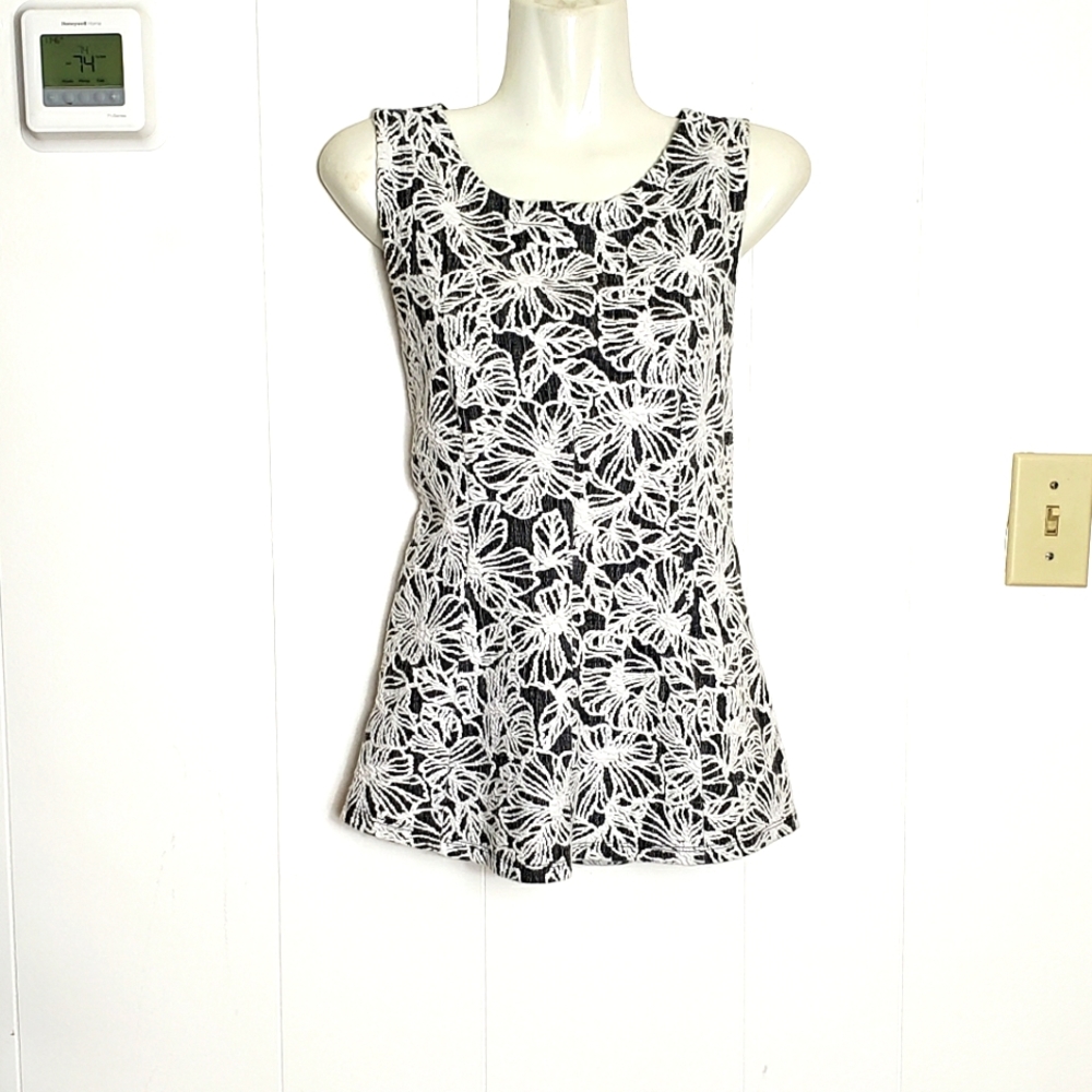 Antroplogie Vanessa Virginia textured peplum style top.